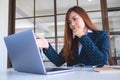 Businesswoman get stressed while having a problem at work