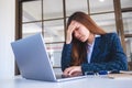 Businesswoman get stressed while having a problem at work