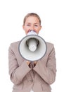 Businesswoman giving instructions with a megaphone Royalty Free Stock Photo