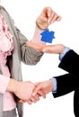 Businesswoman giving a key to her partner. Royalty Free Stock Photo