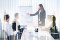 Businesswoman Giving Presentation To Colleagues Amidst Buildings Royalty Free Stock Photo