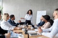 Businesswoman Making Business Presentation For Colleagues In Modern Office Royalty Free Stock Photo