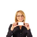 Businesswoman with glasses showing a blank business card Royalty Free Stock Photo