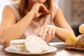 Businesswoman with gluten allergy choosing gluten free crisps