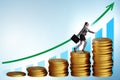 Businesswoman in the growth concept with coins chart Royalty Free Stock Photo