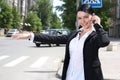 Businesswoman hailing a cab Royalty Free Stock Photo