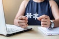 Businesswoman Hand connecting couple puzzle piece in office. Business solutions, mission, successful, goals and strategy concepts