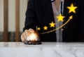 Businesswoman hand ringing silver service bell on hotel reception desk, shows the sign of the top service Quality assurance 5 star