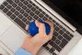 Businesswoman hand squeezing stress ball Royalty Free Stock Photo