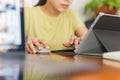 Businesswoman hand typing on computer keyboard with the mouse work from home.