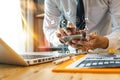 Businesswoman hand working with mobile phone and modern compute with VR icon