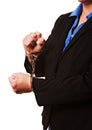 Businesswoman in handcuffs isolated on white