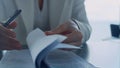 Businesswoman hands checking contract closeup. Lawyer reading legal documents Royalty Free Stock Photo