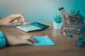 Businesswoman hands using calculator and cost at the office Royalty Free Stock Photo