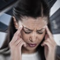 Composite image of businesswoman having an headache Royalty Free Stock Photo