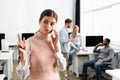 Businesswoman having idea while talking on Royalty Free Stock Photo