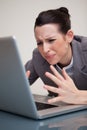 Businesswoman having trouble with her laptop Royalty Free Stock Photo