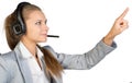 Businesswoman in headset touching or pressing