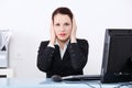 Businesswoman in the hear no evil pose. Royalty Free Stock Photo