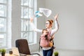 Businesswoman with her baby son working with documents at the office Royalty Free Stock Photo