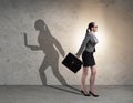 Businesswoman and his shadow in business concept Royalty Free Stock Photo