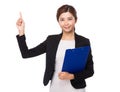 Businesswoman hodling with clipboard and finger point up Royalty Free Stock Photo