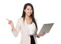 Businesswoman hold with laptop computer and finger point up Royalty Free Stock Photo