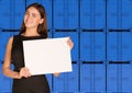 Businesswoman hold paper sheet. Wall of blue Royalty Free Stock Photo