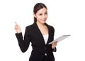 Businesswoman hold with tablet and finger point up Royalty Free Stock Photo