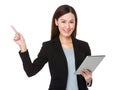 Businesswoman hold with tablet and finger point up Royalty Free Stock Photo