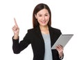 Businesswoman hold with tablet and finger point up Royalty Free Stock Photo