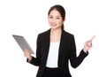 Businesswoman hold with tablet and finger point up Royalty Free Stock Photo