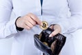 Businesswoman holding bitcoin isolated on a white background.Golden bitcoin coins in women`s hands. Virtual currency. Royalty Free Stock Photo