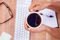 Businesswoman holding black coffee cup Royalty Free Stock Photo