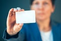 Businesswoman holding blank business card as copy space Royalty Free Stock Photo