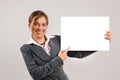 Businesswoman holding a blank page Royalty Free Stock Photo