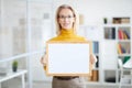 Businesswoman Holding Blank Sign