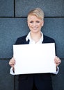 Businesswoman holding blank white sign Royalty Free Stock Photo