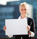 Businesswoman holding blank white sign Royalty Free Stock Photo