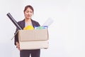 Businesswoman holding box leaving office after quitting job Royalty Free Stock Photo