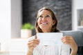 Businesswoman Holding Cheque Royalty Free Stock Photo