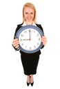 Businesswoman holding clock