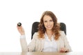 Businesswoman holding eight billiard ball. Royalty Free Stock Photo