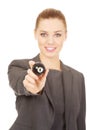 Businesswoman holding eight billiard ball. Royalty Free Stock Photo