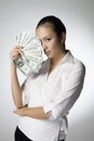 Businesswoman holding money. Conceptual image Royalty Free Stock Photo