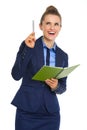 Businesswoman holding open notebook and pen having aha moment Royalty Free Stock Photo