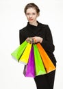 Businesswoman holding papper bags