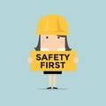Businesswoman holding safety first sign Royalty Free Stock Photo