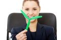 Businesswoman holding small windmill Royalty Free Stock Photo