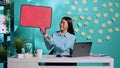 Businesswoman holding speech bubble sign Royalty Free Stock Photo